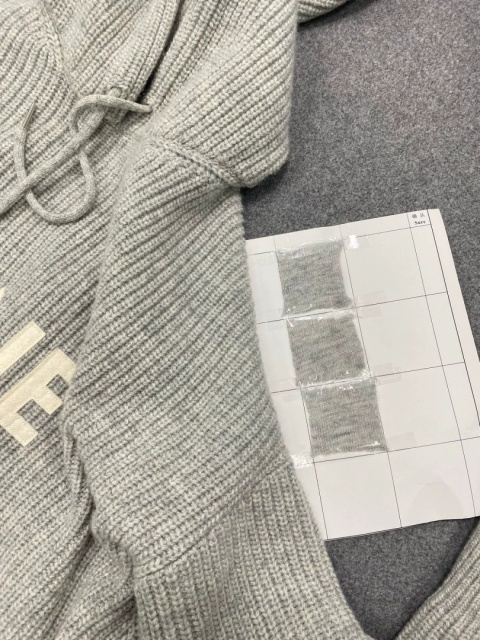 Wełniana bluza z kaptuem Celine